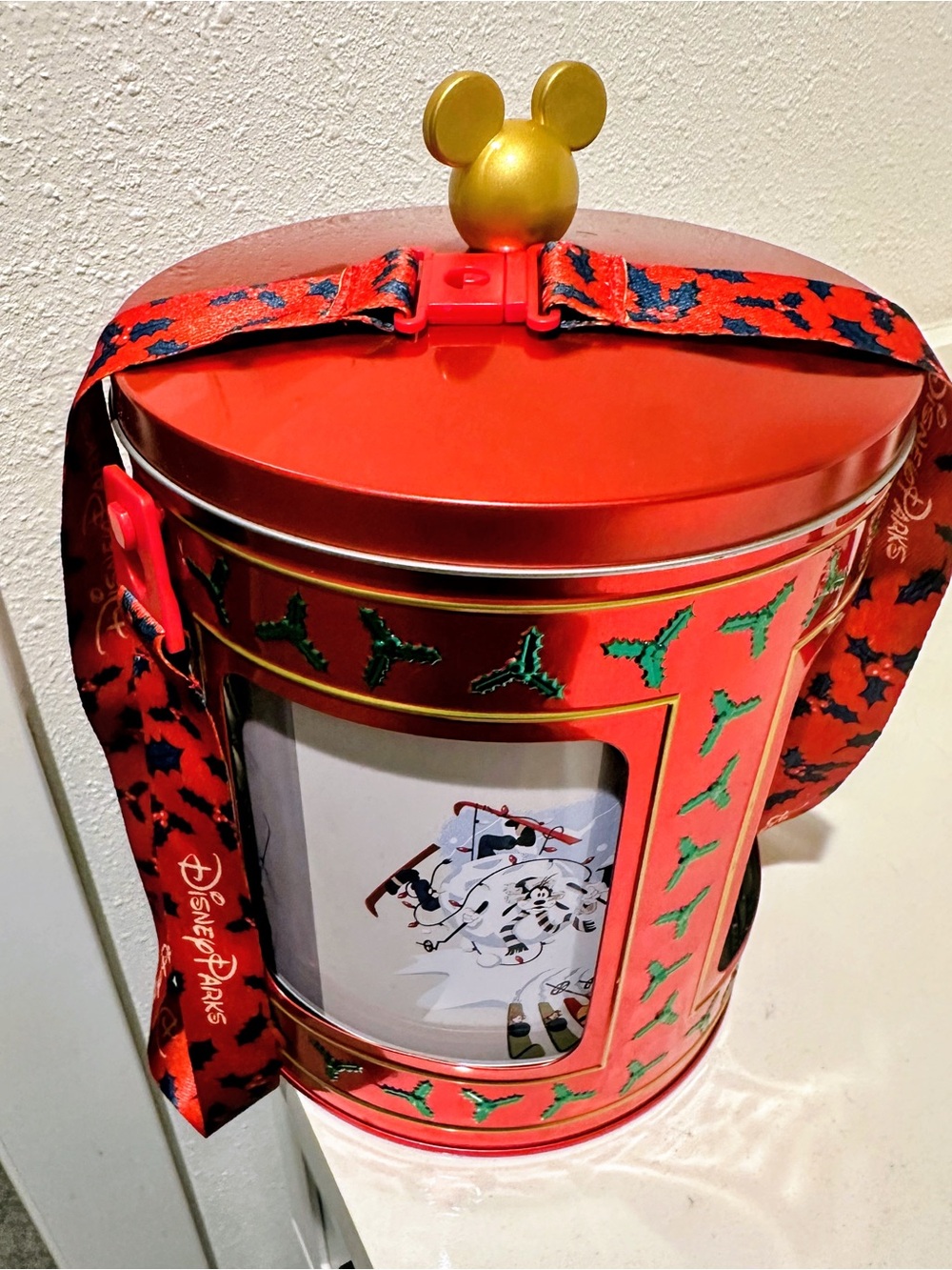 Disney Red Holiday Tin with Gold Mickey Topper and Green Trim